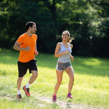 Couple jogging outdoors